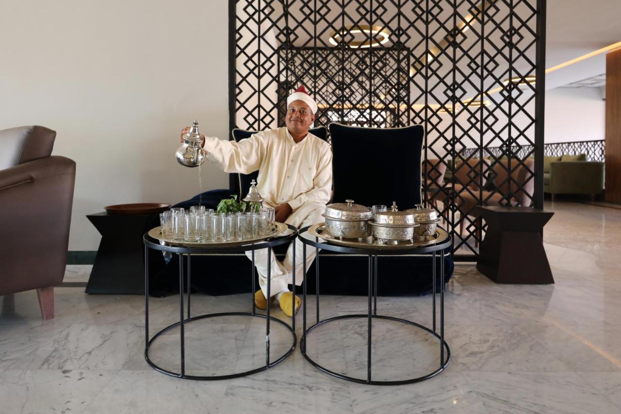 Kenzi Rose Garden Hotel Marrakesh Buitenkant foto A Moroccan tea ceremony