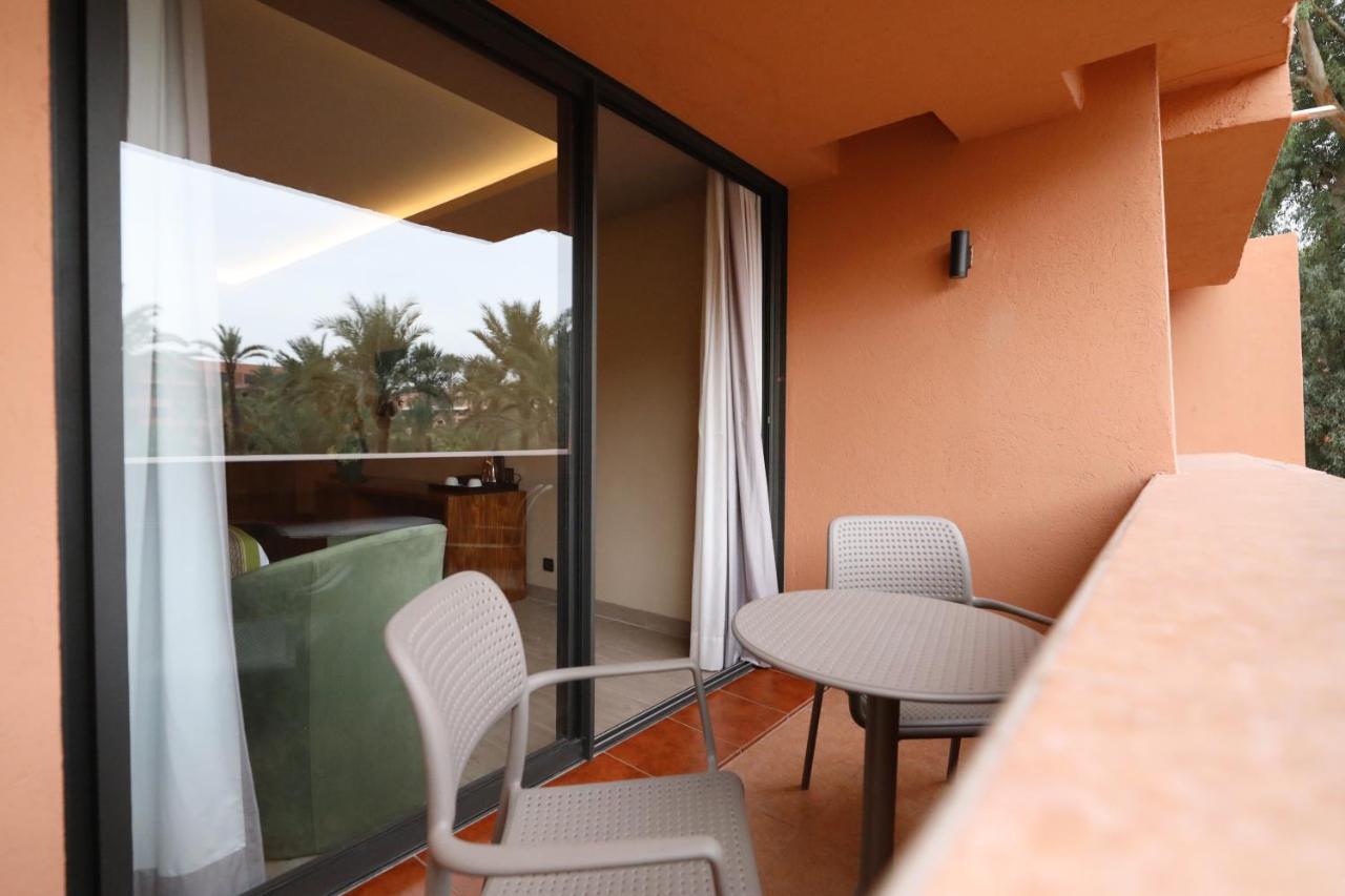 Kenzi Rose Garden Hotel Marrakesh Buitenkant foto A balcony at the hotel