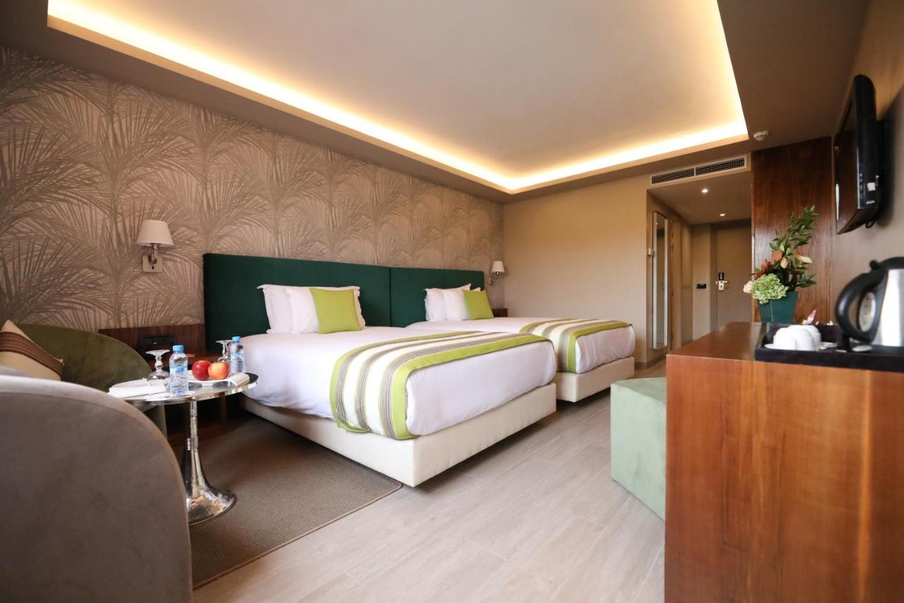 Kenzi Rose Garden Hotel Marrakesh Buitenkant foto A room at the hotel