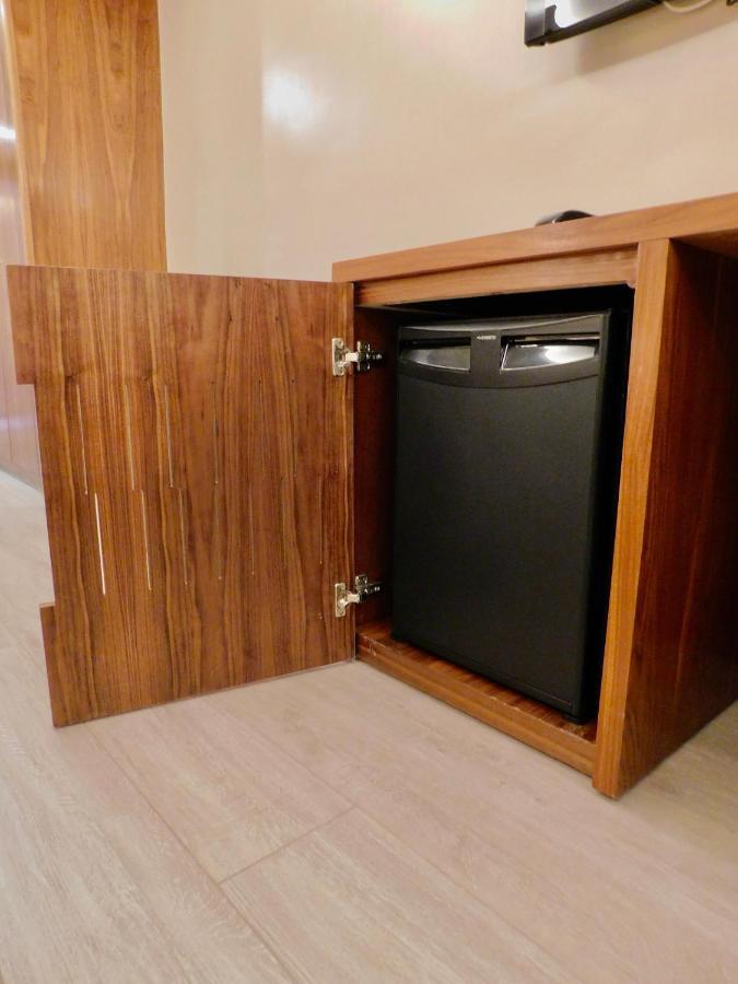 Kenzi Rose Garden Hotel Marrakesh Buitenkant foto A dishwasher in a cabinet