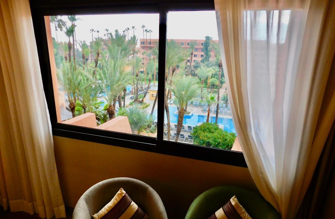 Kenzi Rose Garden Hotel Marrakesh Buitenkant foto View from a room at the hotel