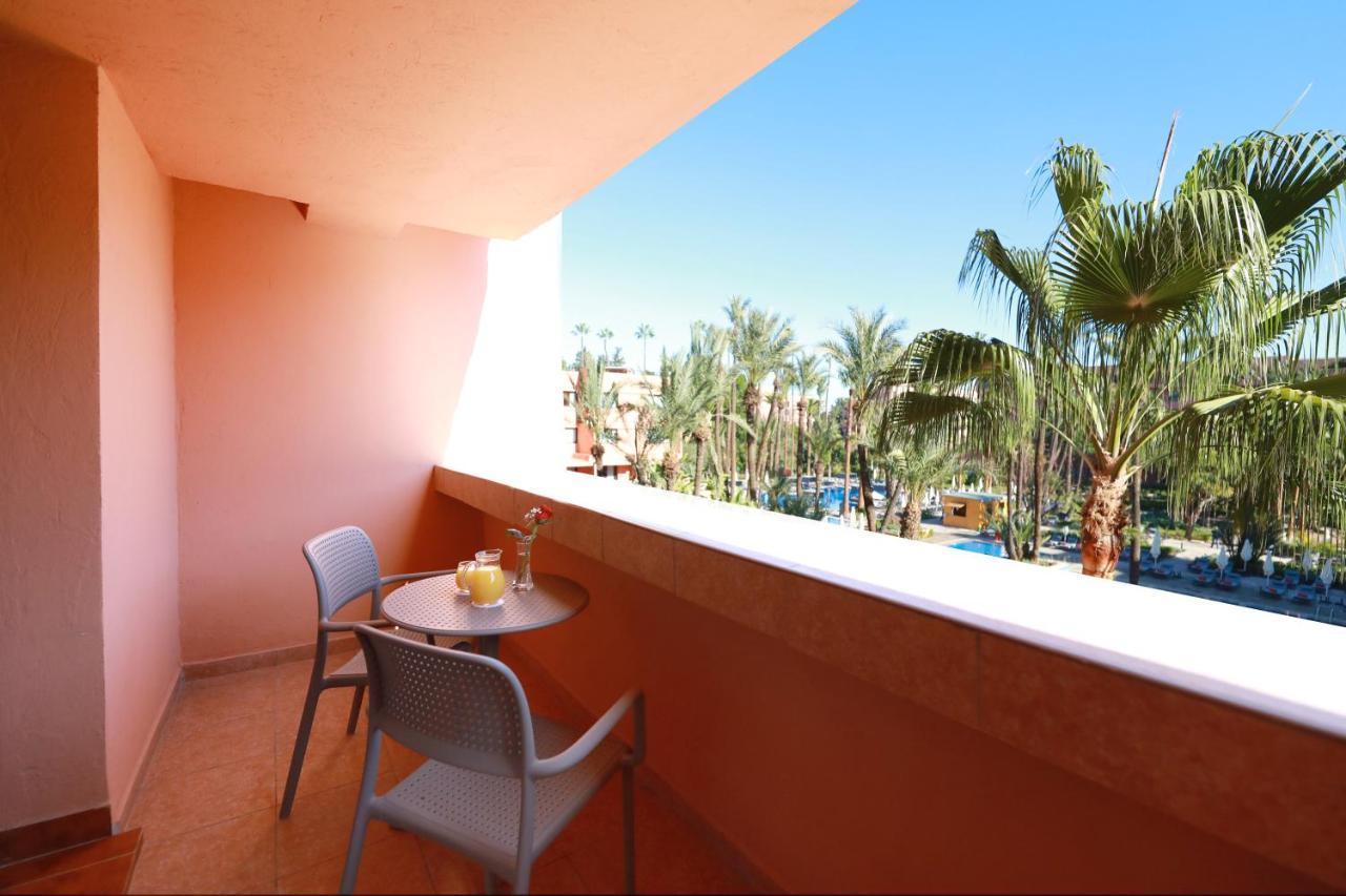 Kenzi Rose Garden Hotel Marrakesh Buitenkant foto A balcony
