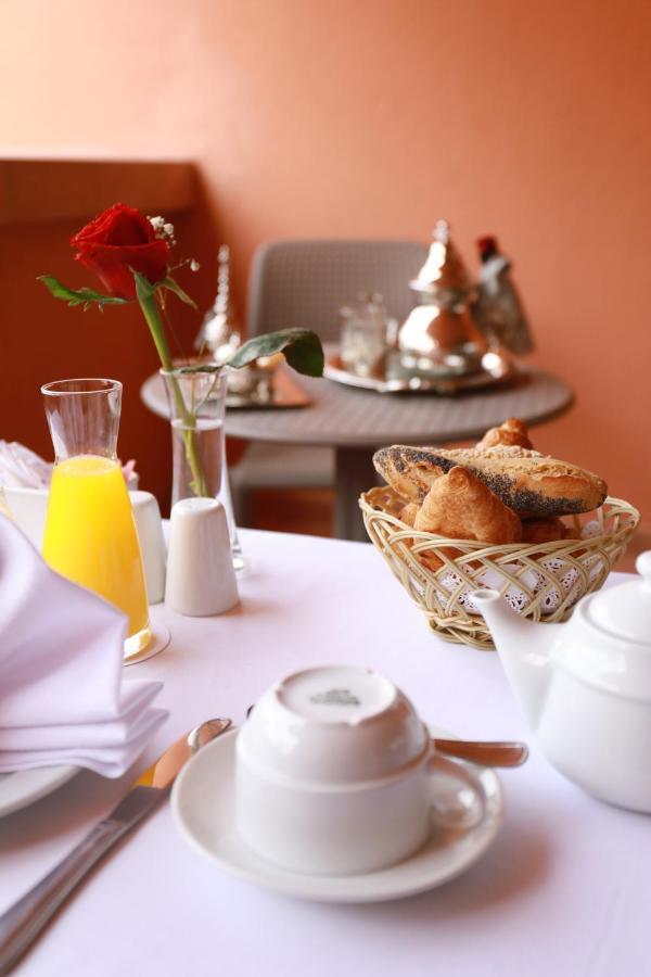 Kenzi Rose Garden Hotel Marrakesh Buitenkant foto A breakfast table