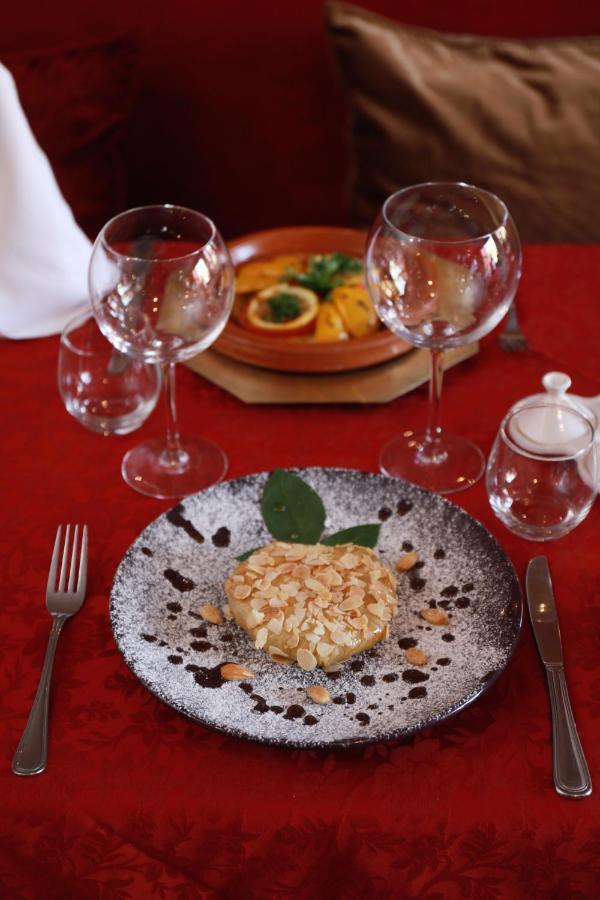 Kenzi Rose Garden Hotel Marrakesh Buitenkant foto A typical Portuguese table setting